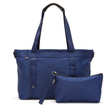 Convertible Large ANDI travel tote in navy blue color with detachable handheld wristlet pouch