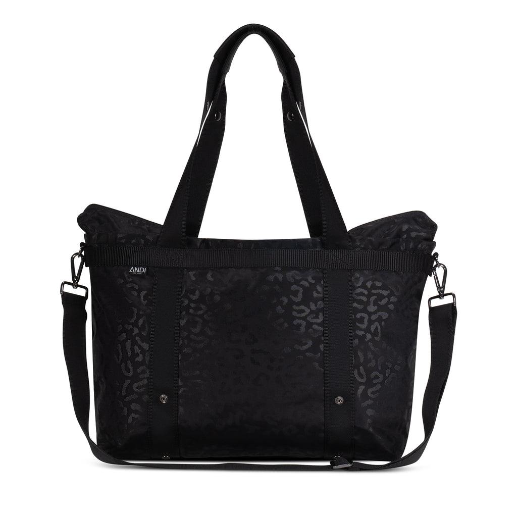 Lightweight convertible ANDI Large travel tote in black leopard print with adjustable straps