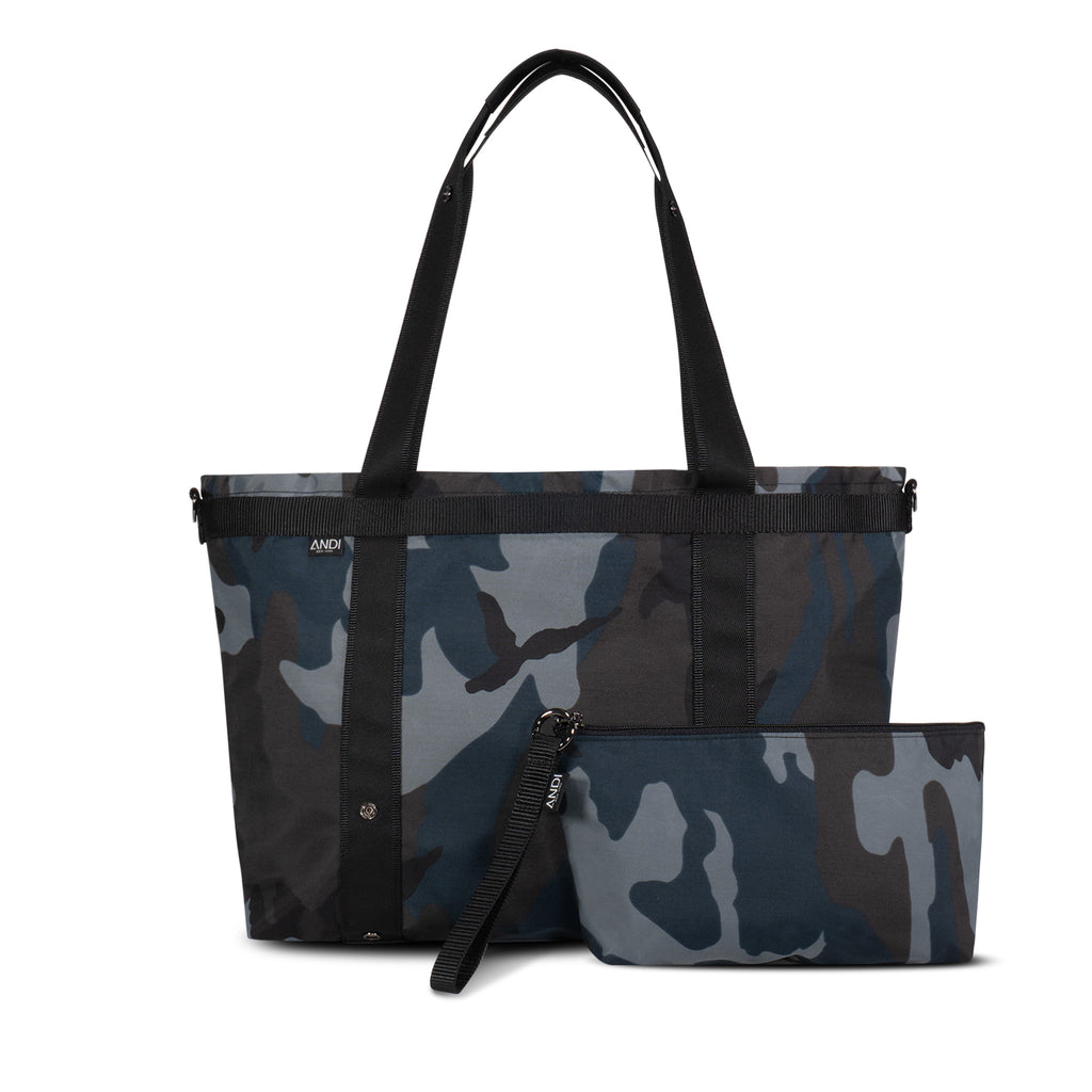 Large convertible travel tote in blue camo with handheld wristlet pouch | ANDI Brand