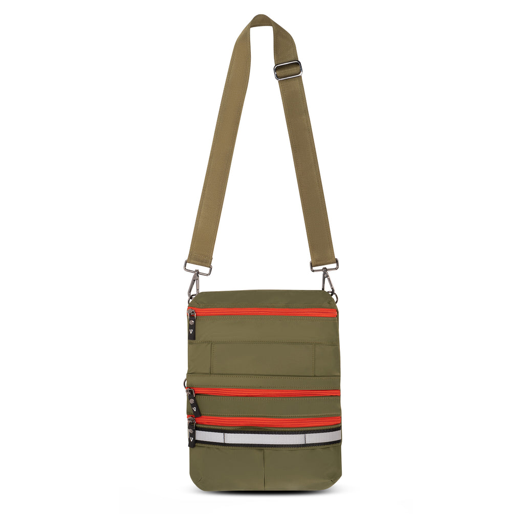 Water resistant crossbody belt bag that triples in carrying capacity in expanded form | ANDI Brand
