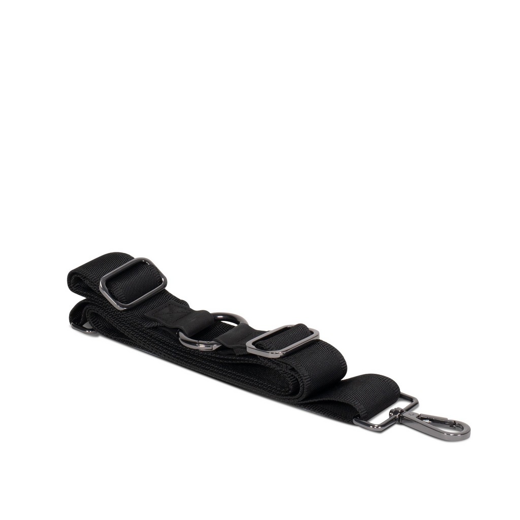Black nylon utility strap that converts ANDI bag into a backpack | Gunmetal hardware