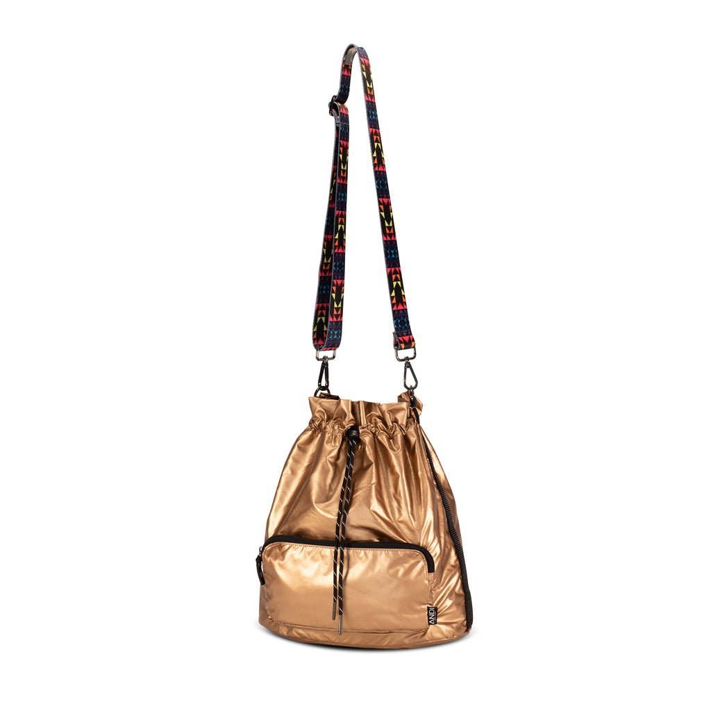 Womens crossbody bag in metallic rose gold with removable fun straps | ANDI nylon bucket