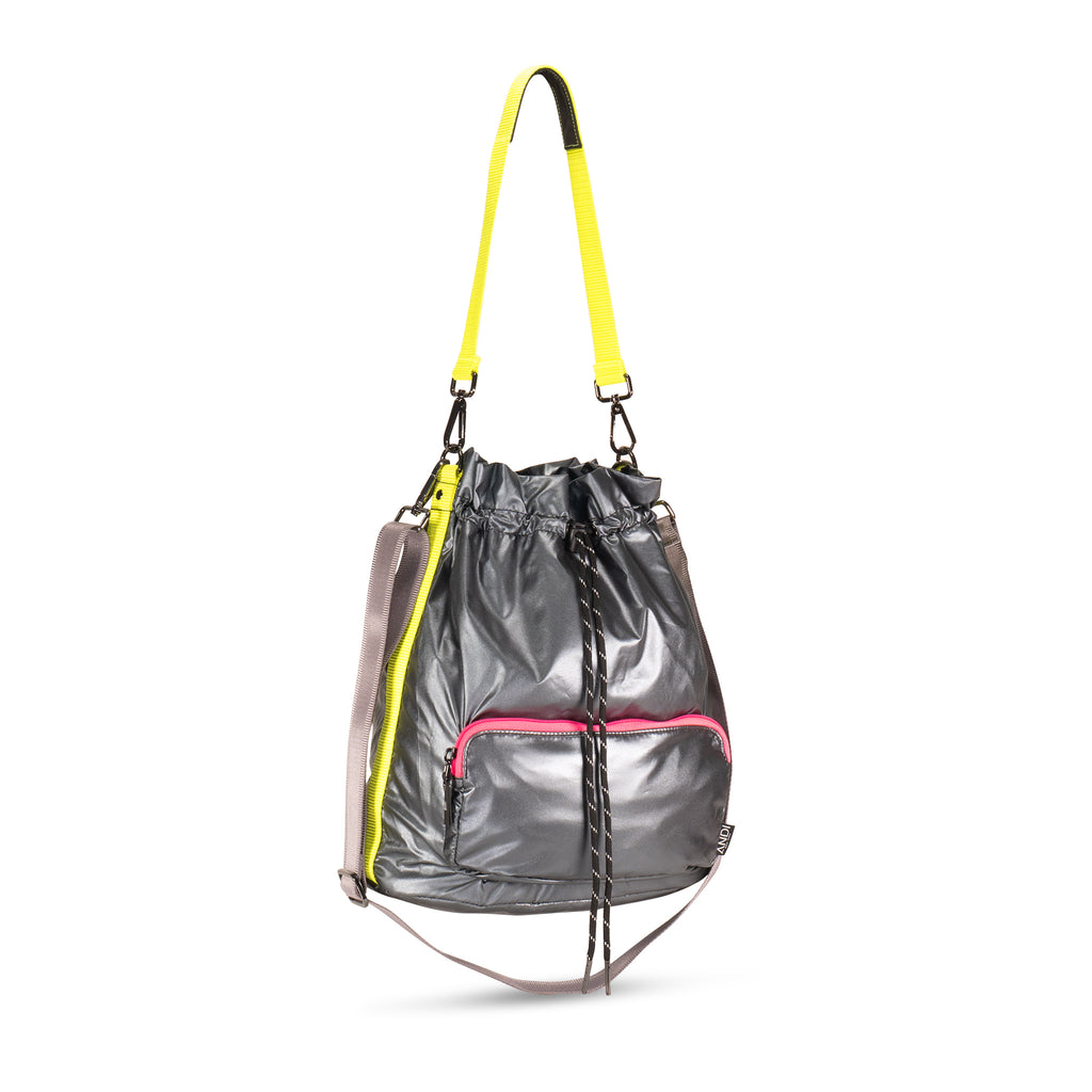 Light-weight nylon cross-body bucket bag in metallic silver with neon yellow | Hot pink | ANDI Brand