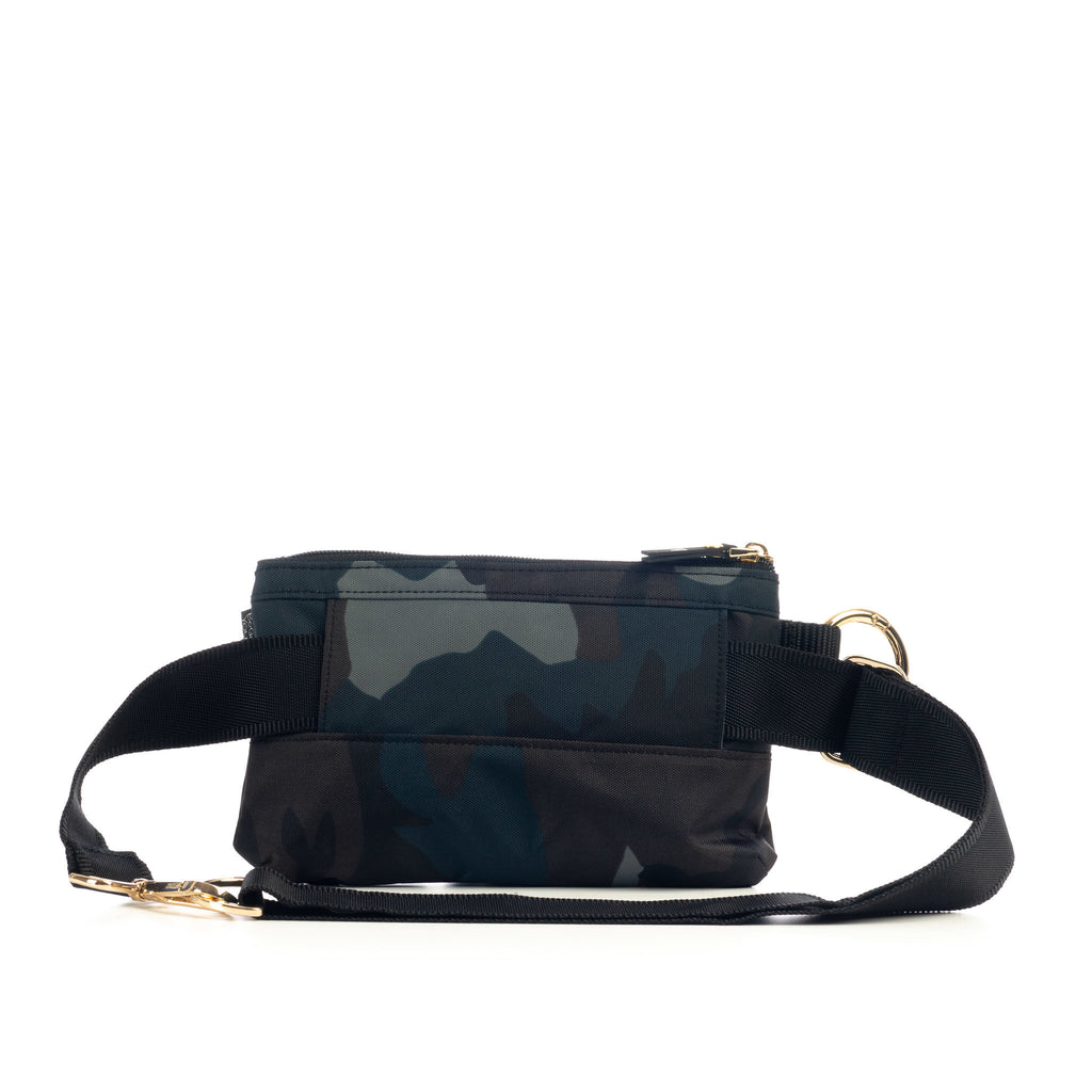 Back of ANDI convertible handheld clutch in blue camouflage with adjustable straps