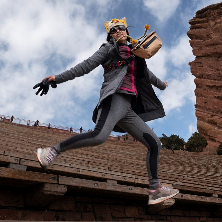 Women flying with ANDI Waist-pack in cross-body style at Red Rocks