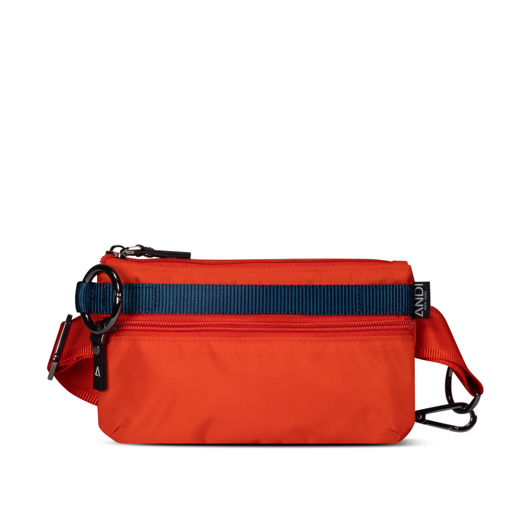 Small ANDI pouch purse in orange color with adjustible straps